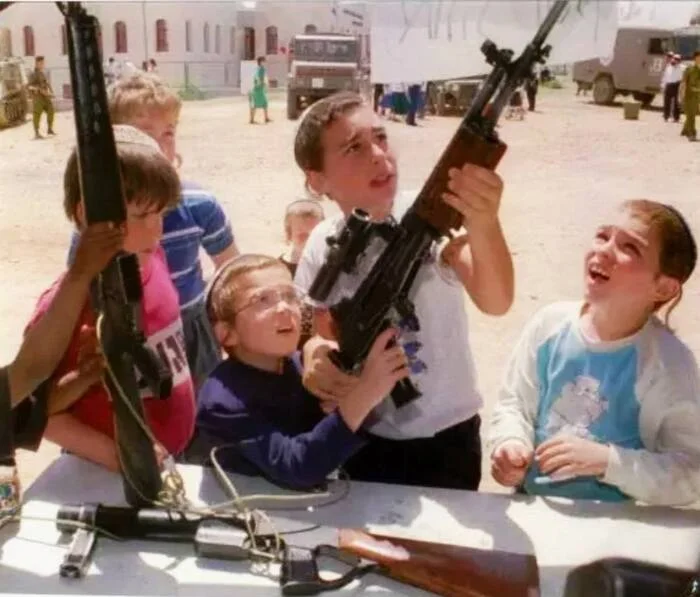 Israeli Independence Day, children of the Kiryat Arba settlement become familiar with weapons April 14, 1989 - Israel, Children, Weapon, Independence Day