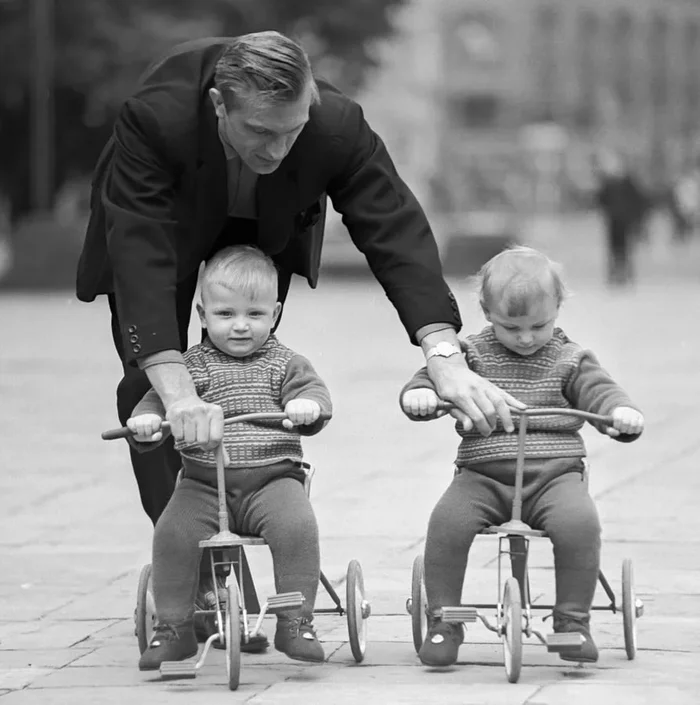 A father teaches his twin children to ride a tricycle. 1968 - the USSR, Father, Education, Childhood memories, Childhood in the USSR, Parents, Made in USSR, A bike, Memory, Childhood, 60th, Telegram (link)