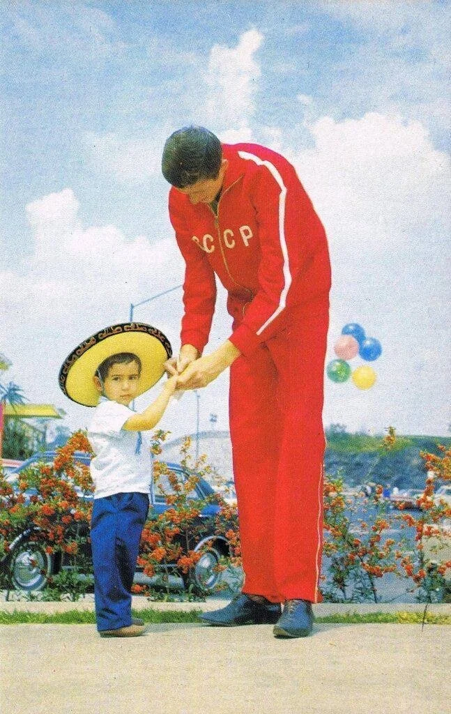 Soviet basketball player Sergei Kovalenko gives an autograph to a boy. Mexico, 1968 - Sport, Basketball, Mexico, the USSR, Competitions, Telegram (link), Retro, Made in USSR