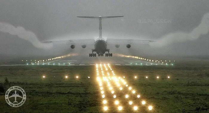 IL-76 landing - Aviation, Airplane, Flight, Pilot, civil Aviation, Military aviation, The airport, Runway strip, Night light, Silt, IL-76, Landing, The photo, Transport aviation