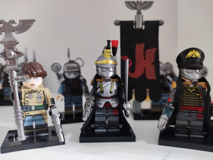 Маршал корпуса смерти Крига со свитой - комиссар, псайкер, знаменосец, связист.