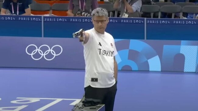 About the shooter with his hand in his pocket (original) and him - Shooting, Turkey, Olympic Games, Vitalina Batsarashkina, Yusuf DikeГ§, A wave of posts