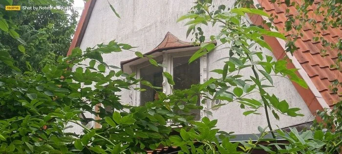 Old carved wooden window frames in a mini attic bay window - My, Kaliningrad, Kaliningrad region, City walk, Street photography, The photo, Architecture