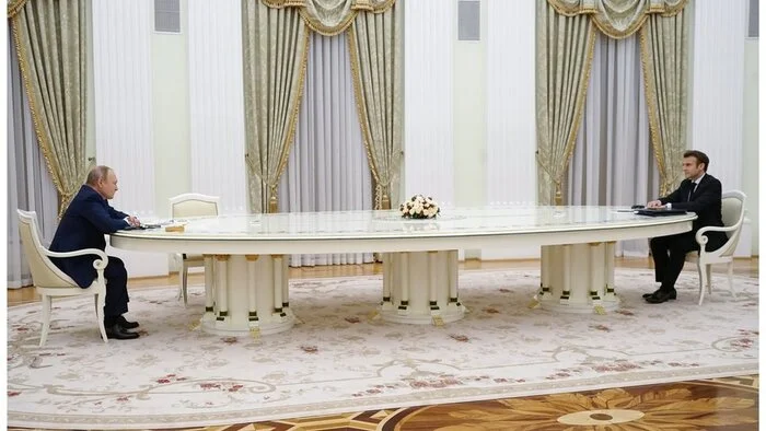 Putin and the long table - My, Vladimir Putin, Table, Humor, Distance, Black Cloak, Assumption, Politics