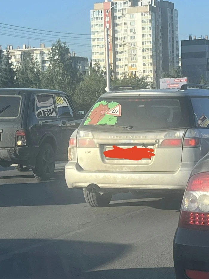 Somewhere in a Krasnoyarsk traffic jam... - Traffic jams, Humor, Folk art, Sign of the SPIKE, Stickers on cars, Auto, Street photography