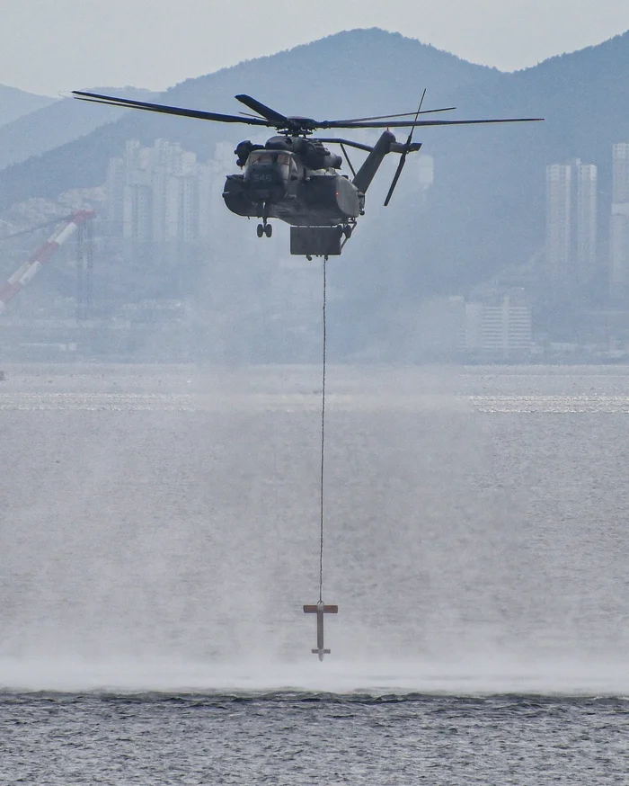 A sea dragon dips a long... buoy into the water - Military equipment, Aviation, Helicopter, Ch-53, Sonar, Buoy, Suspension, Strange humor, Professional humor, The photo