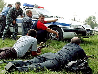 Men of Beslan, having learned that their loved ones have been taken hostage, take out their weapons and begin to gather around the school - Beslan, Negative, The photo, Courage, Men, Tragedy, Militia, North Ossetia Alania, Longpost