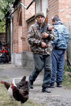 Men of Beslan, having learned that their loved ones have been taken hostage, take out their weapons and begin to gather around the school - Beslan, Negative, The photo, Courage, Men, Tragedy, Militia, North Ossetia Alania, Longpost