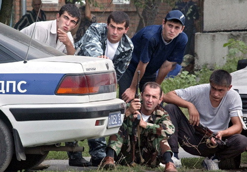 Men of Beslan, having learned that their loved ones have been taken hostage, take out their weapons and begin to gather around the school - Beslan, Negative, The photo, Courage, Men, Tragedy, Militia, North Ossetia Alania, Longpost