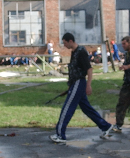 Men of Beslan, having learned that their loved ones have been taken hostage, take out their weapons and begin to gather around the school - Beslan, Negative, The photo, Courage, Men, Tragedy, Militia, North Ossetia Alania, Longpost