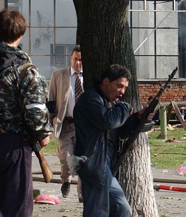 Men of Beslan, having learned that their loved ones have been taken hostage, take out their weapons and begin to gather around the school - Beslan, Negative, The photo, Courage, Men, Tragedy, Militia, North Ossetia Alania, Longpost