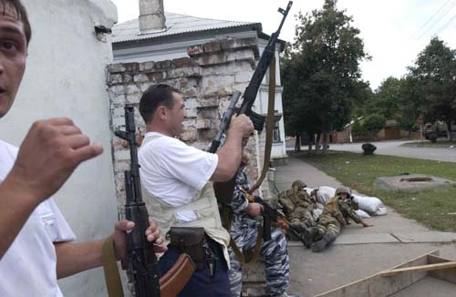 Men of Beslan, having learned that their loved ones have been taken hostage, take out their weapons and begin to gather around the school - Beslan, Negative, The photo, Courage, Men, Tragedy, Militia, North Ossetia Alania, Longpost