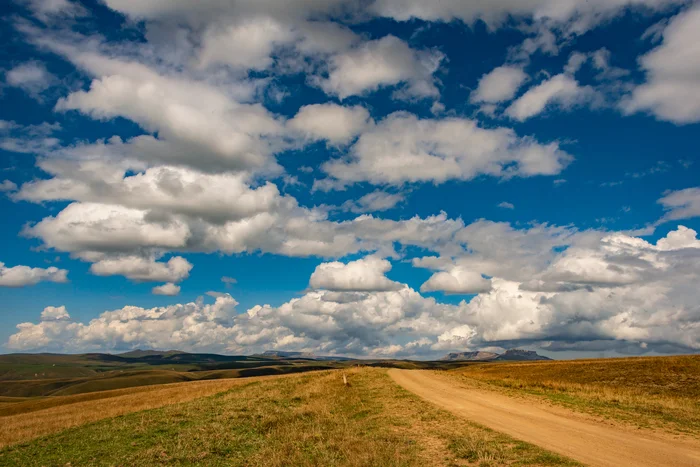 Road with clouds. Karachay-Cherkessia, altitude 2300 m - My, The photo, Nature, Landscape, Clouds, Karachay-Cherkessia