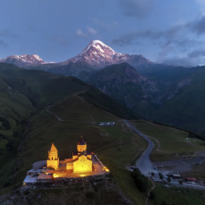 Kazbek at dawn - Photographer, The photo, Landscape, Nature, The mountains, Kazbek, Temple, Gergeti, Trinity Church, dawn, Georgia, Georgian Military Road