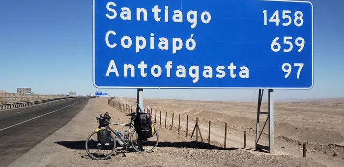 On the road to Santiago. They are transporting spare parts for quarry dump trucks - My, Bike trip, Solo travel, Travels, A bike, South America, Chile, Atacama Desert, Desert, Cyclist, Andes, Road, Bike ride, The rocks, Longpost, The photo