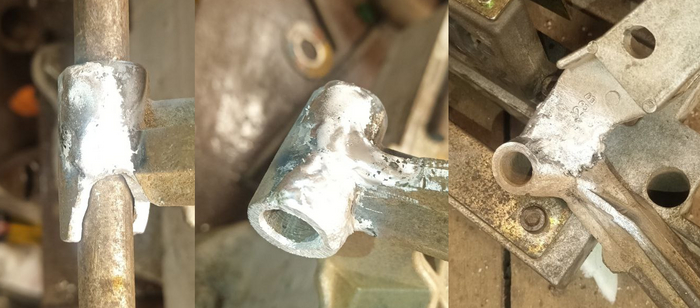 Заварил трещины, наплавил недостающие части, приварил отломанные составляющие, все смазал. Работает, крутится.