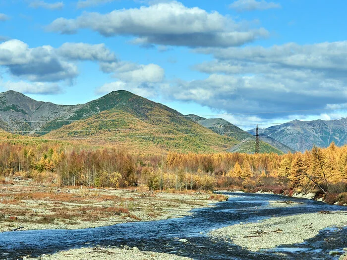 Kolyma Highway (through the car window) - My, Kolyma, Landscape, River, Mountain river, Mountain road, Forest, Taiga, The sun, Hills, The mountains, A harsh land, Beautiful view, Autumn, Clouds, Sky, Longpost