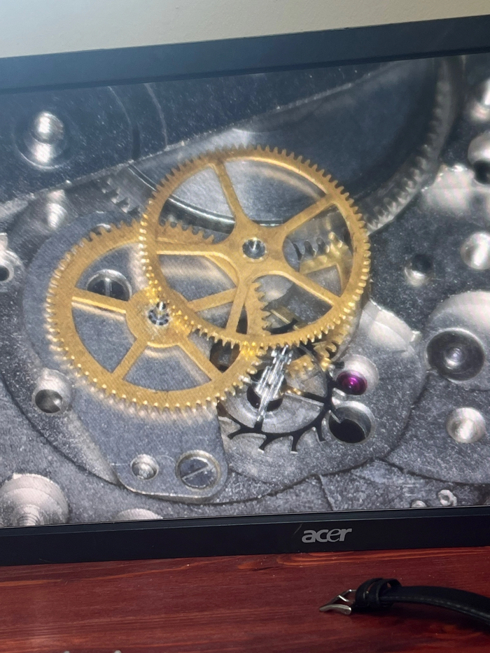 Это ангренаж - основная колесная система, участвующая в передачи момента движения от барабана к узлу хода ( на фото его нет)