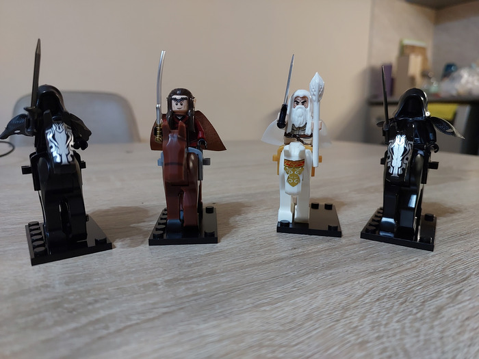 Элронд, Гэндальф и два кольценосца