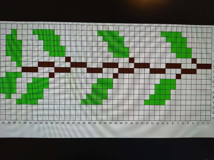 Веточка вышита способом "петля в петлю".