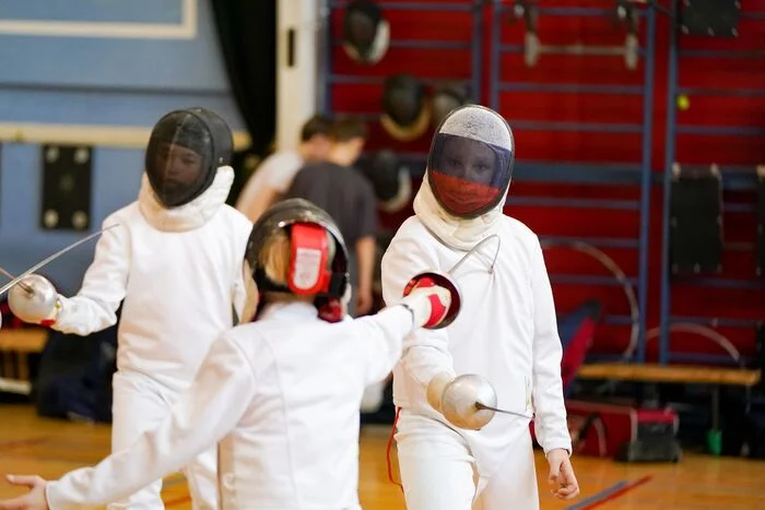 Why do fencers compete in white? Is the suit sturdy? What is that cord sticking out from under the jacket... and other answers - Fencing, Sport, Longpost