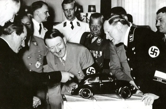 Ferdinand Porsche shows Hitler a model of the Volkswagen people's car in 1935 - History (science), Nazism, Porsche, Volkswagen, The photo, Repeat