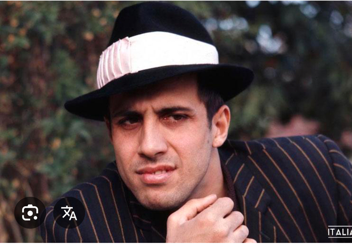 Где Челентано поет про есаула?