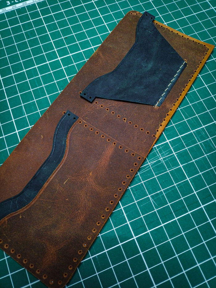 что бы клей держал карман, надо склеиваемую часть зачистить от покрытия (лицо обнажить)