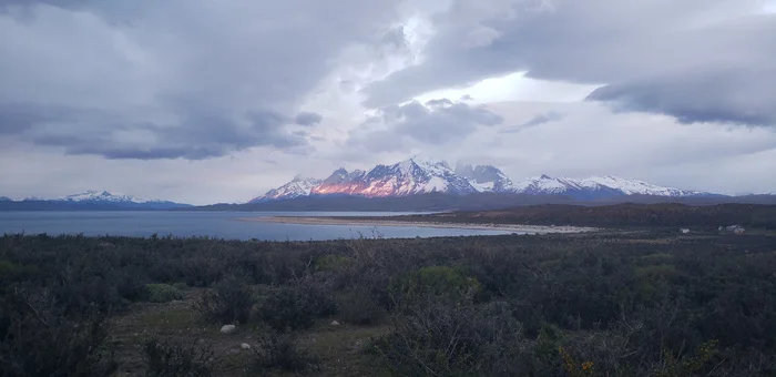 Stayed overnight near Torres del Paine - My, A bike, Travels, Bike trip, Solo travel, South America, Chile, Patagonia, Torres Del Paine, Andes, Bike ride, Cyclist, Cycling, Mountain tourism, Lake, Road, The mountains, The rocks, Longpost
