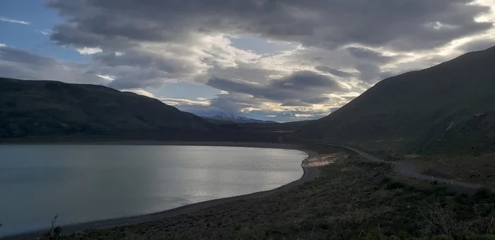 Stayed overnight near Torres del Paine - My, A bike, Travels, Bike trip, Solo travel, South America, Chile, Patagonia, Torres Del Paine, Andes, Bike ride, Cyclist, Cycling, Mountain tourism, Lake, Road, The mountains, The rocks, Longpost