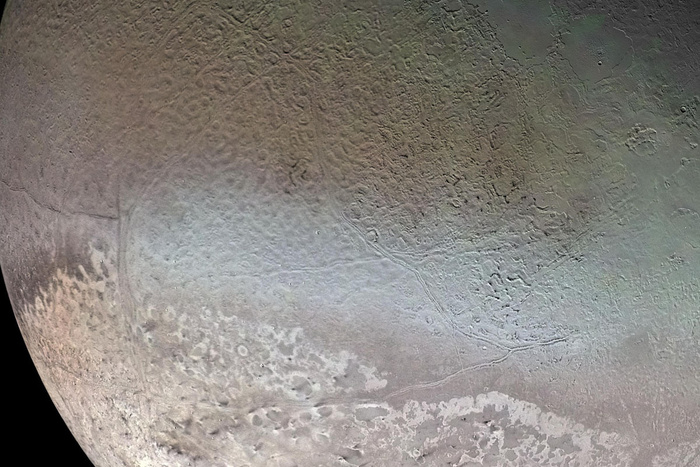 "Земля дыни" в верхней части изображения. Снимок был получен "Вояджером-2" 25 августа 1989 года / © NASA/JPL