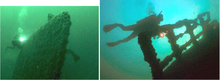 Болгарские дайверы осматривают найденные летом 2010 г. обломки подлодки.