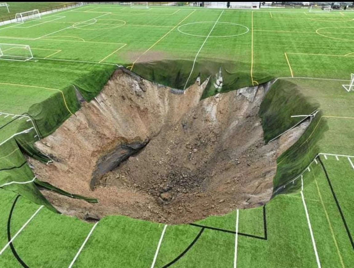 Sinkhole in the middle of a football field in Alton, Illinois - Stadium, Karst Sinkhole, USA, Telegram (link)