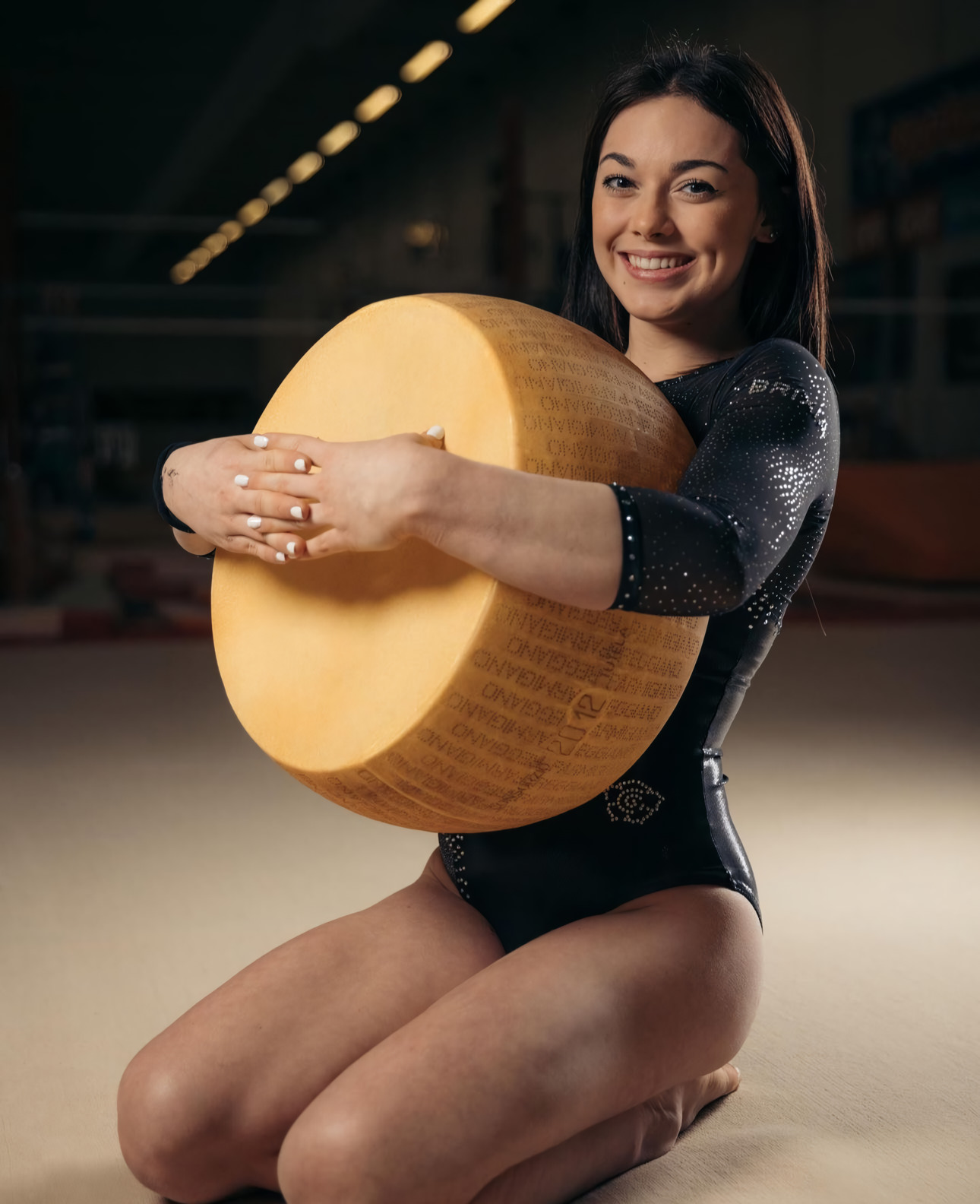 Olympic silver medalist and Italian gymnast Giorgia Villa, posing for Parmigiano Reggiano with large cheese wheels - Cheese, Gymnasts, Longpost, Olympic Games