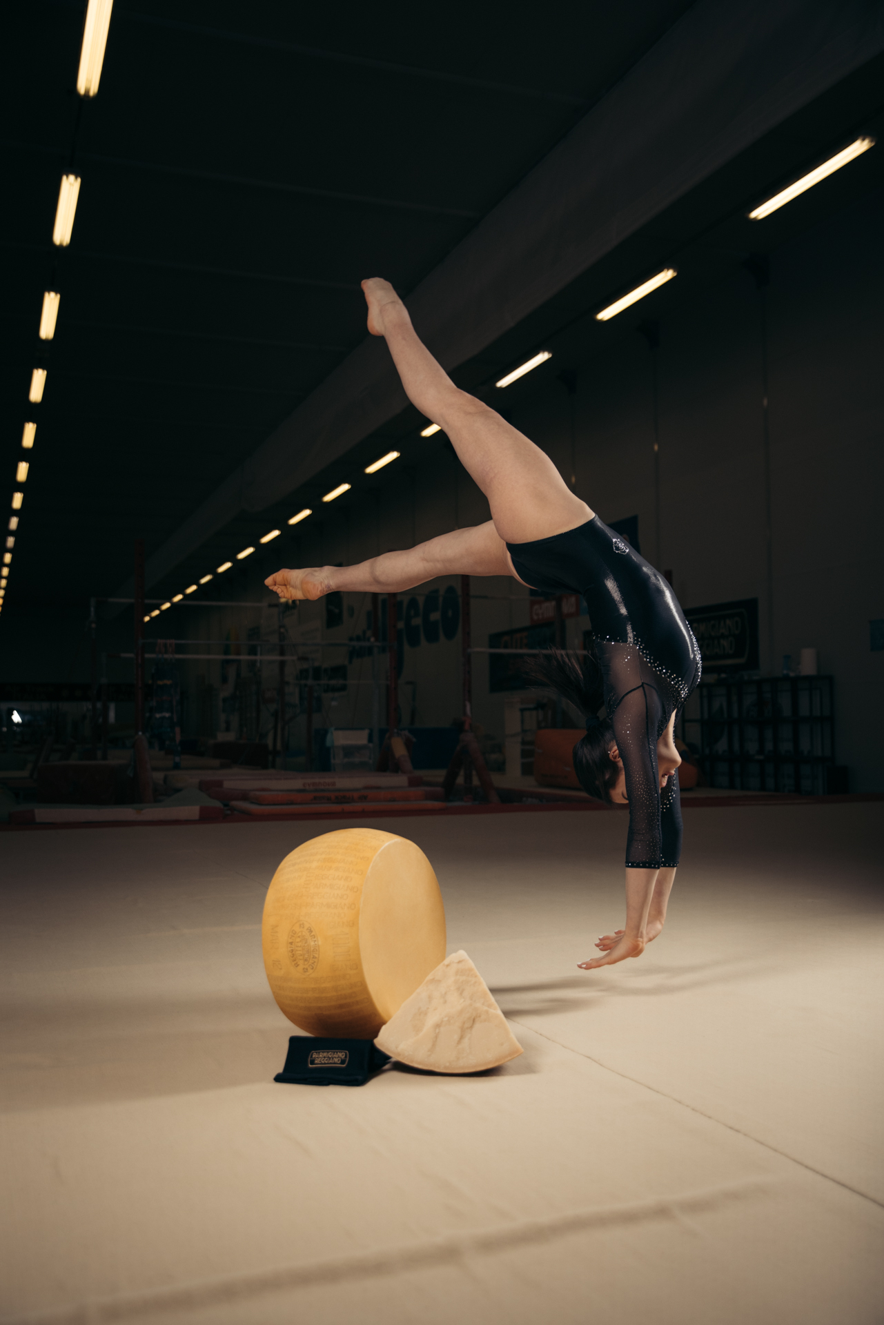 Olympic silver medalist and Italian gymnast Giorgia Villa, posing for Parmigiano Reggiano with large cheese wheels - Cheese, Gymnasts, Longpost, Olympic Games