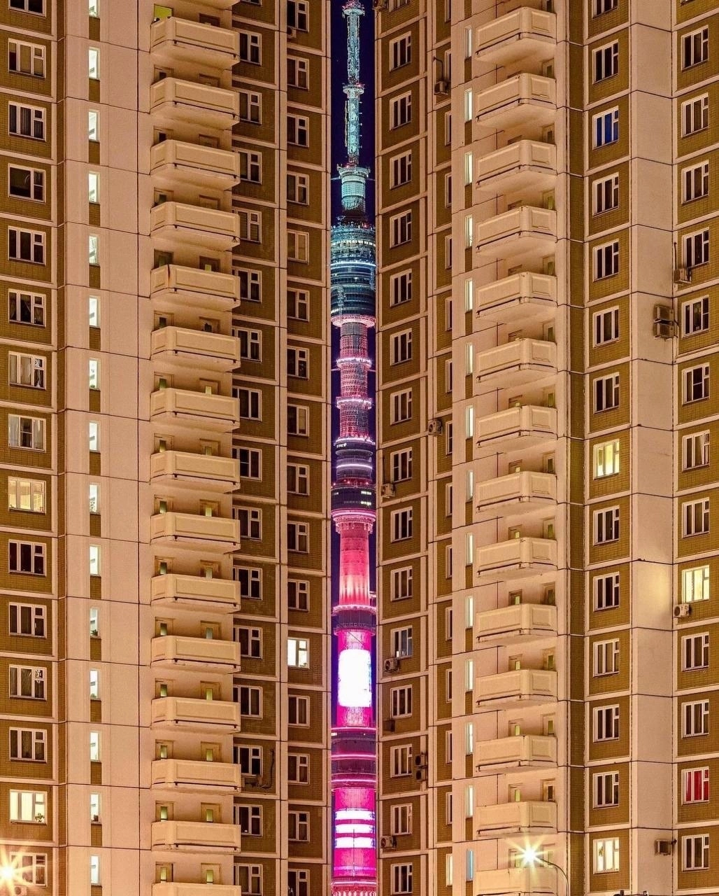 Ostankino tower between two residential buildings, Moscow - Ostankino tower, High-rise building, Moscow, The photo