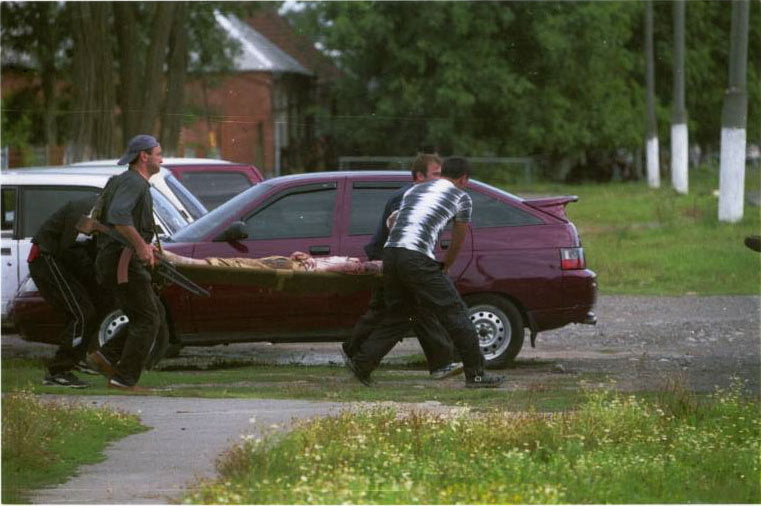 Men of Beslan, having learned that their loved ones have been taken hostage, take out their weapons and begin to gather around the school - Beslan, Negative, The photo, Courage, Men, Tragedy, Militia, North Ossetia Alania, Longpost