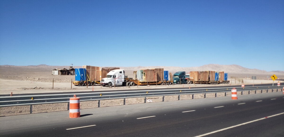 On the road to Santiago. They are transporting spare parts for quarry dump trucks - My, Bike trip, Solo travel, Travels, A bike, South America, Chile, Atacama Desert, Desert, Cyclist, Andes, Road, Bike ride, The rocks, Longpost, The photo