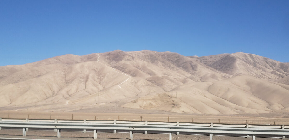 On the road to Santiago. They are transporting spare parts for quarry dump trucks - My, Bike trip, Solo travel, Travels, A bike, South America, Chile, Atacama Desert, Desert, Cyclist, Andes, Road, Bike ride, The rocks, Longpost, The photo