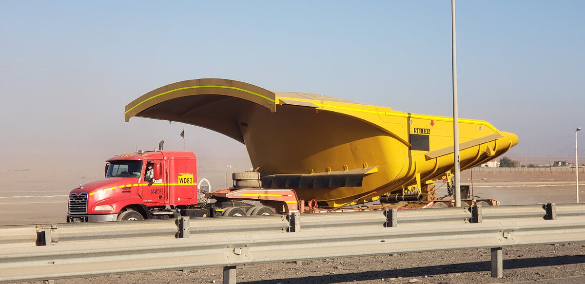 On the road to Santiago. They are transporting spare parts for quarry dump trucks - My, Bike trip, Solo travel, Travels, A bike, South America, Chile, Atacama Desert, Desert, Cyclist, Andes, Road, Bike ride, The rocks, Longpost, The photo