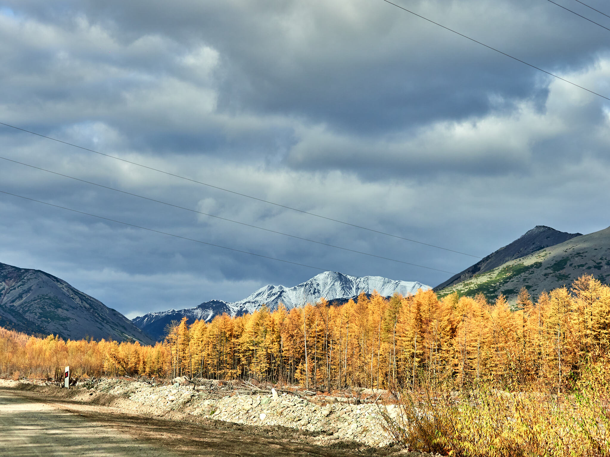 Kolyma Highway (through the car window) - My, Kolyma, Landscape, River, Mountain river, Mountain road, Forest, Taiga, The sun, Hills, The mountains, A harsh land, Beautiful view, Autumn, Clouds, Sky, Longpost