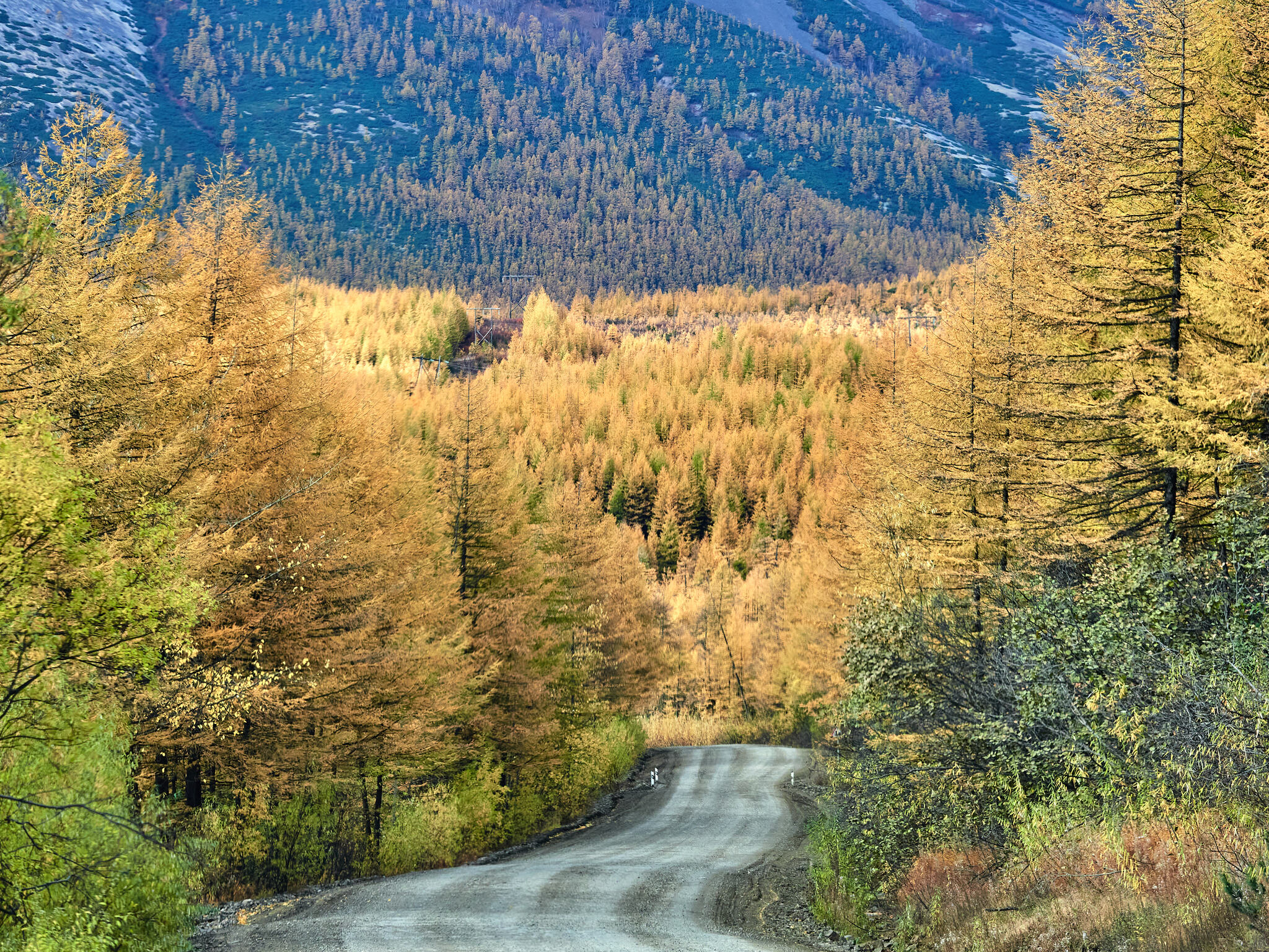 Kolyma Highway (through the car window) - My, Kolyma, Landscape, River, Mountain river, Mountain road, Forest, Taiga, The sun, Hills, The mountains, A harsh land, Beautiful view, Autumn, Clouds, Sky, Longpost