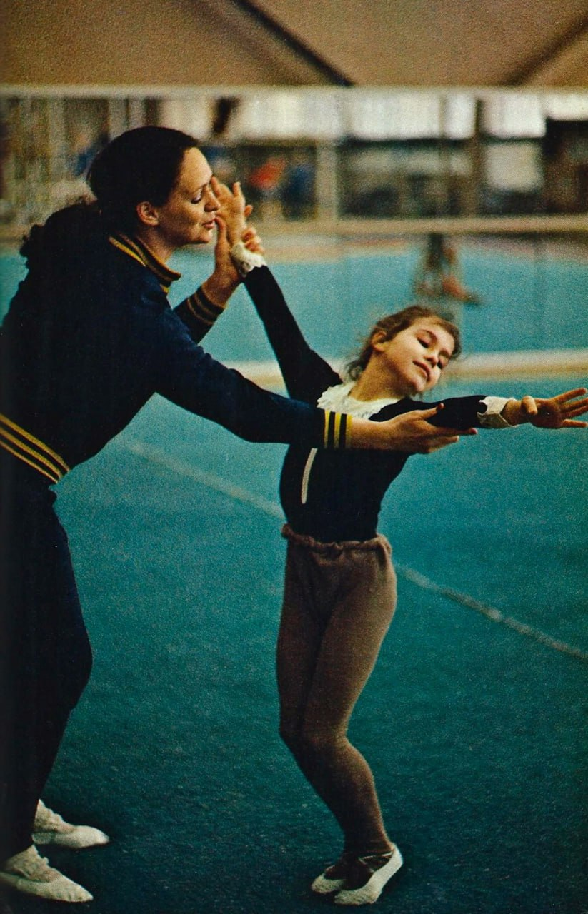 A student learns to add the grace of a ballerina to her acrobatic tricks at a special sports school in Moscow, USSR, 1978 - the USSR, Acrobatics, Ballerinas, Ballet, School, Moscow, Made in USSR, Childhood in the USSR, Retro, Pupils, 70th, Telegram (link)